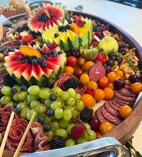 Charcuterie board in Glendora, CA with fresh fruit, artisan meats, cheeses, and gourmet snacks by Rose Gold Charcuterie.