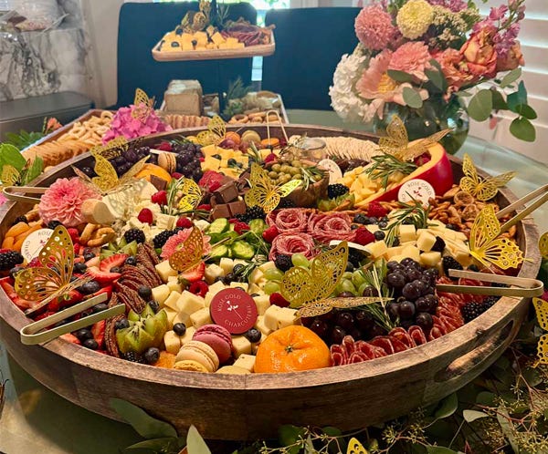 Extra-large charcuterie platter in Glendora, CA with artisan meats, cheeses, olives, fresh fruit, pretzels, and macarons by Rose Gold Charcuterie.