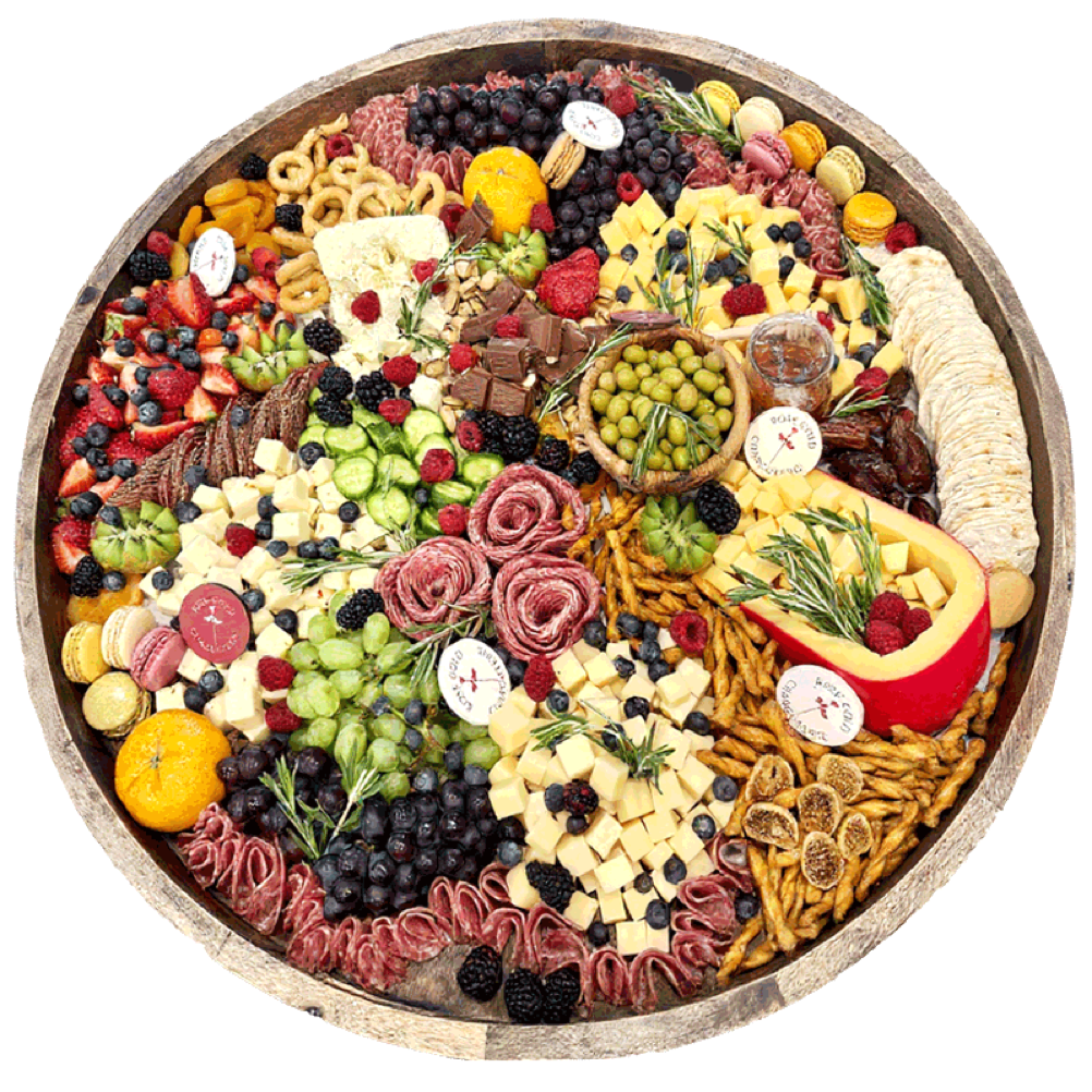 Custom rose gold charcuterie board featuring gourmet cheese, cured meats, fresh fruit, crackers, and dips — perfect for weddings, corporate events, and grazing table catering in Southern California.
