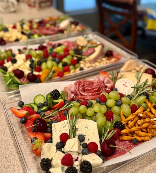 Handcrafted grazing trays filled with fruit, cheeses, meats, and snacks for events in Glendora and San Dimas by Rose Gold Charcuterie.